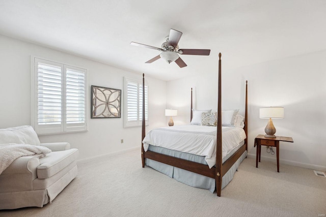 bedroom with baseboards, carpet, and a ceiling fan