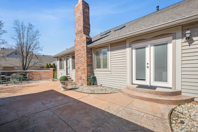 view of patio / terrace with outdoor dining space and french doors