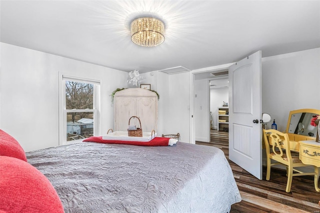 bedroom featuring wood finished floors