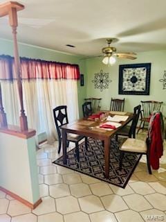 dining area with a ceiling fan