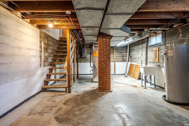 basement with water heater, stairs, and electric panel