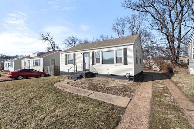 view of front of property with a front lawn