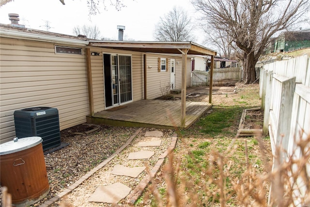 view of yard with cooling unit and a fenced backyard