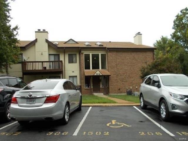 view of uncovered parking lot