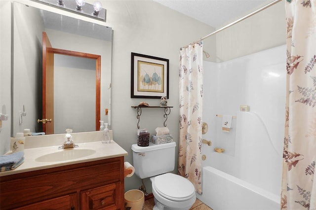 bathroom featuring shower / tub combo, vanity, and toilet