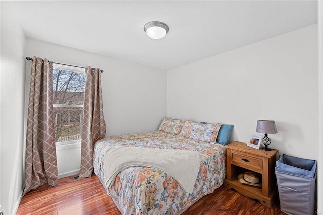 bedroom featuring wood-type flooring