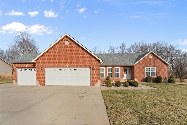 ranch-style home with a garage, concrete driveway, roof with shingles, a front lawn, and brick siding