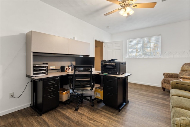 office space with ceiling fan, dark wood-style flooring, and baseboards