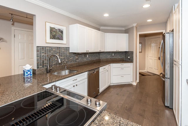 kitchen featuring white cabinets, dark wood-style flooring, stainless steel appliances, and a sink