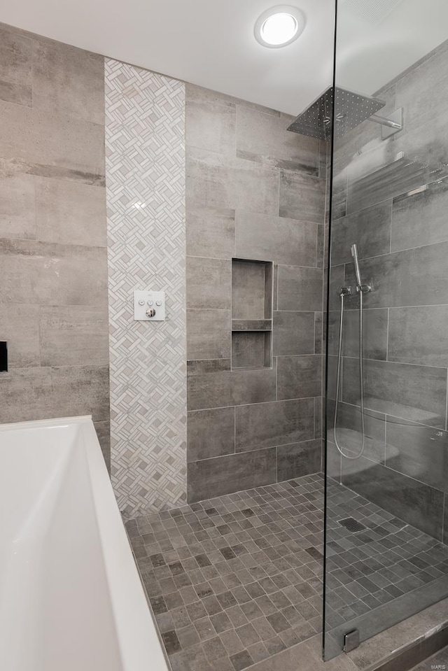 full bathroom with a walk in shower