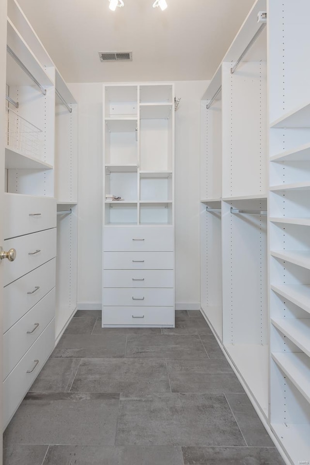 walk in closet featuring visible vents