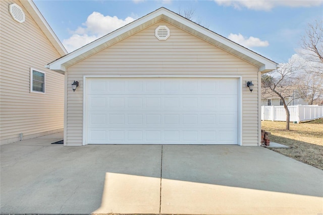 detached garage with fence