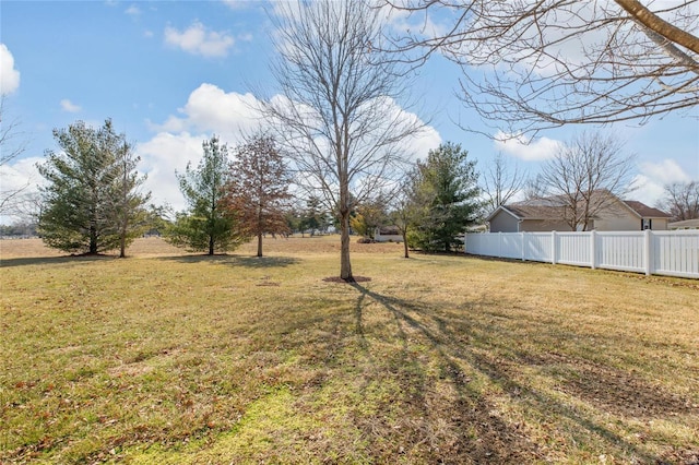 view of yard featuring fence