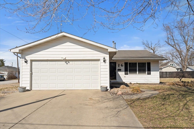 ranch-style home featuring a garage, driveway, and fence