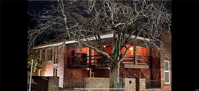 view of home's exterior featuring brick siding