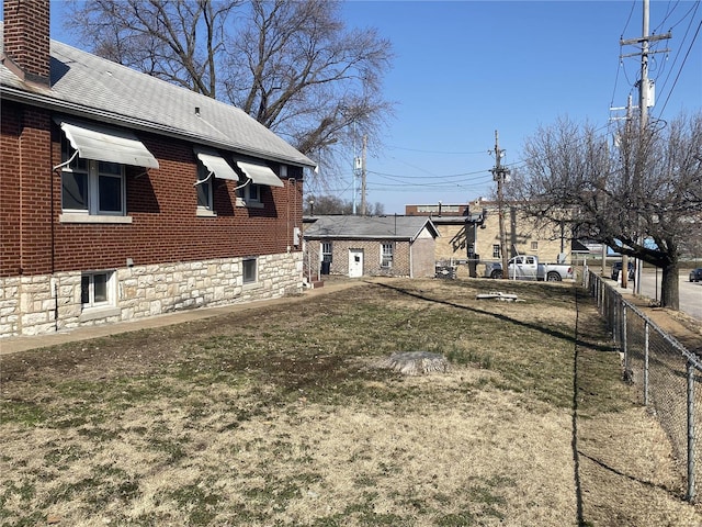 view of yard with fence