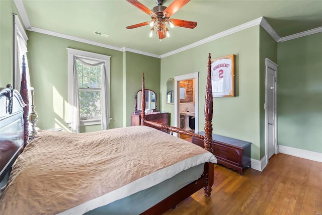 bedroom featuring visible vents, baseboards, ornamental molding, ceiling fan, and hardwood / wood-style floors