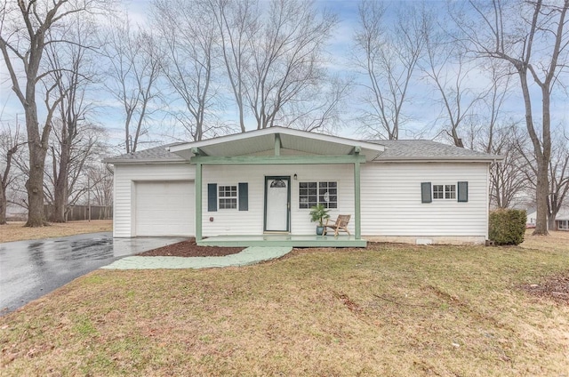 view of front facade with driveway, covered porch, an attached garage, and a front lawn