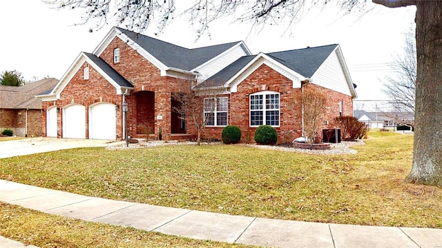 view of front facade with concrete driveway, brick siding, a front lawn, and an attached garage