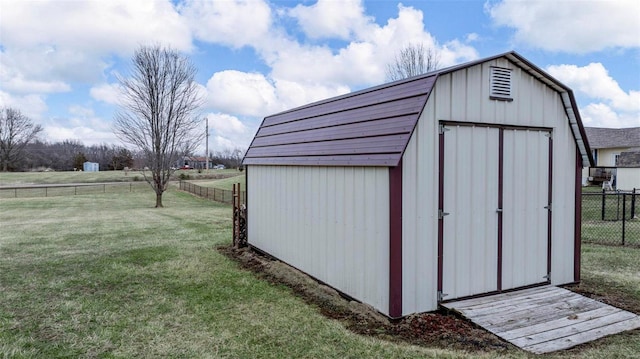 view of shed featuring a fenced backyard