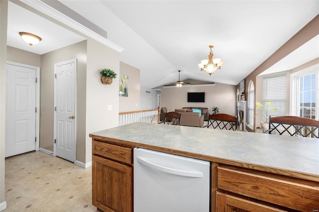 kitchen featuring dishwasher, lofted ceiling, brown cabinets, open floor plan, and decorative light fixtures