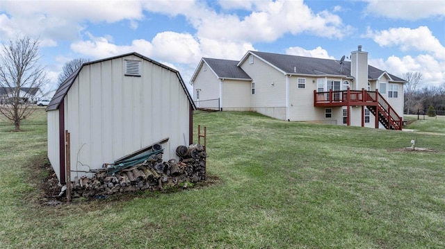 exterior space with a storage unit, stairway, a deck, and an outdoor structure