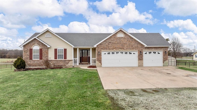 single story home featuring an attached garage, brick siding, fence, concrete driveway, and a front yard