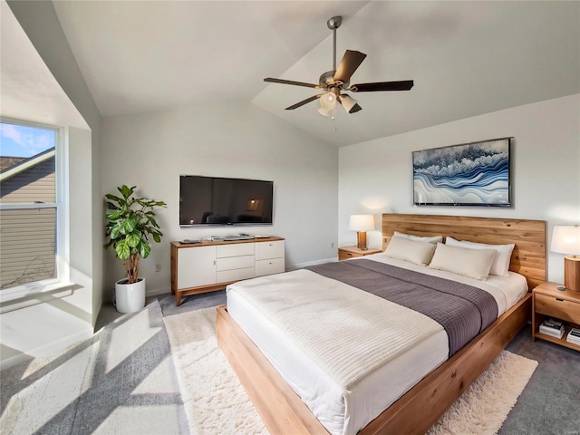 bedroom with a ceiling fan, lofted ceiling, light colored carpet, and baseboards