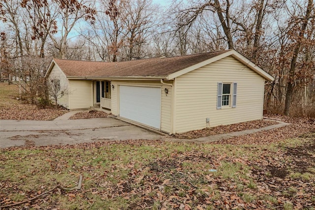 exterior space with an attached garage and driveway