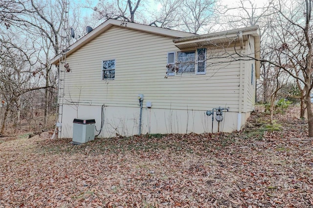 view of home's exterior featuring central AC unit