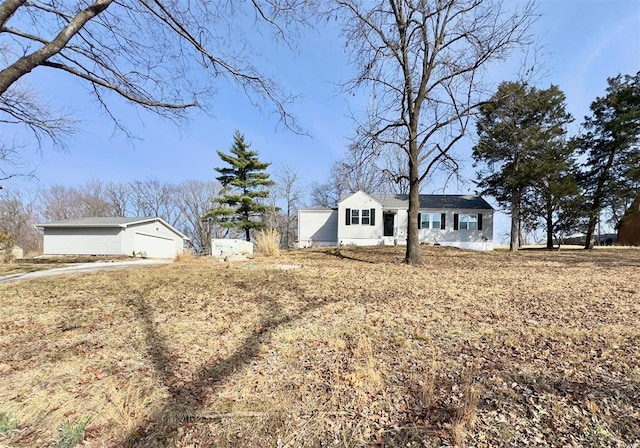 ranch-style house with an outbuilding