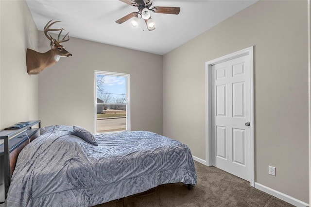 bedroom with ceiling fan, carpet, and baseboards