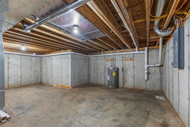 unfinished below grade area featuring electric water heater