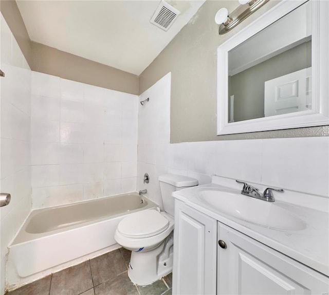 bathroom featuring visible vents, toilet, shower / bathtub combination, tile patterned floors, and vanity