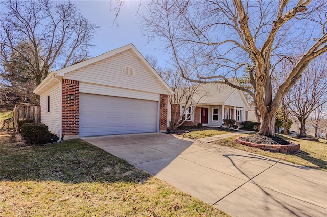 ranch-style home with driveway, an attached garage, a front lawn, and brick siding