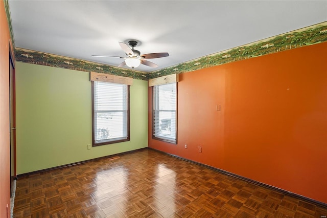 spare room featuring ceiling fan