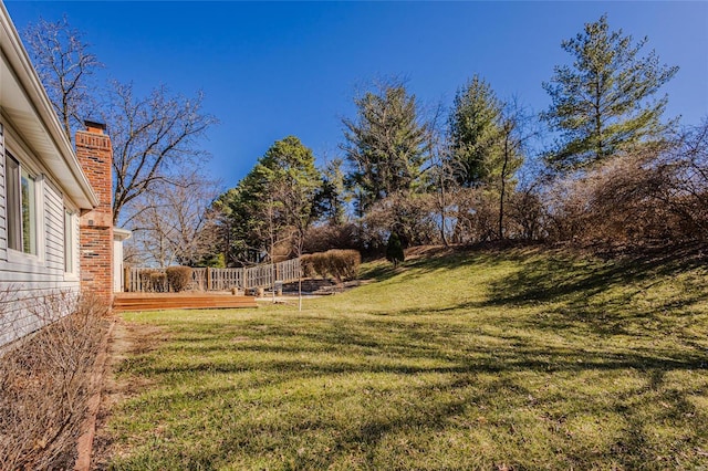 view of yard featuring a deck