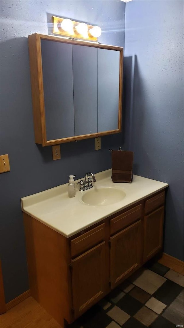 bathroom featuring vanity and tile patterned floors