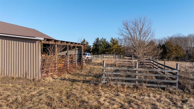 view of yard featuring an outdoor structure and an exterior structure