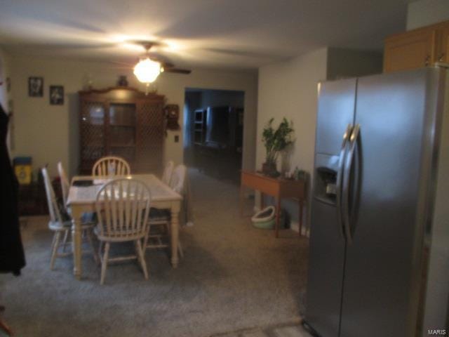 view of carpeted dining space