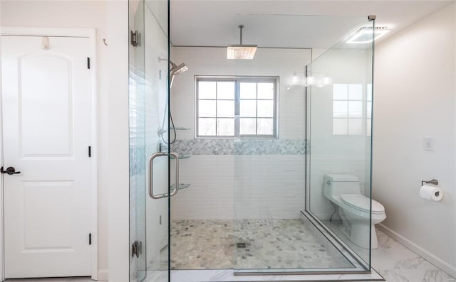 full bath featuring visible vents, baseboards, toilet, marble finish floor, and a shower stall