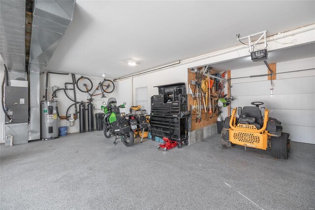 garage featuring a garage door opener and electric water heater