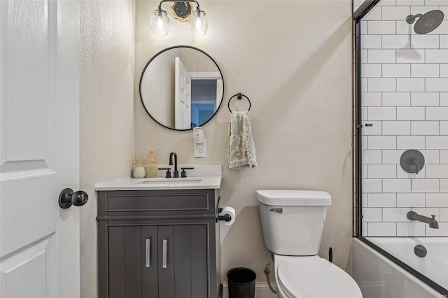 bathroom featuring toilet, shower / washtub combination, and vanity