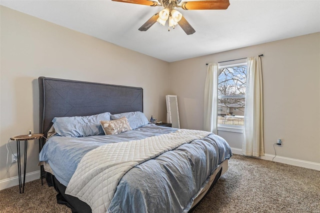 carpeted bedroom with ceiling fan and baseboards