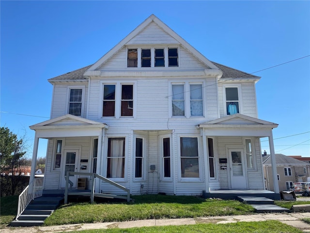 view of front facade featuring a porch and a front yard