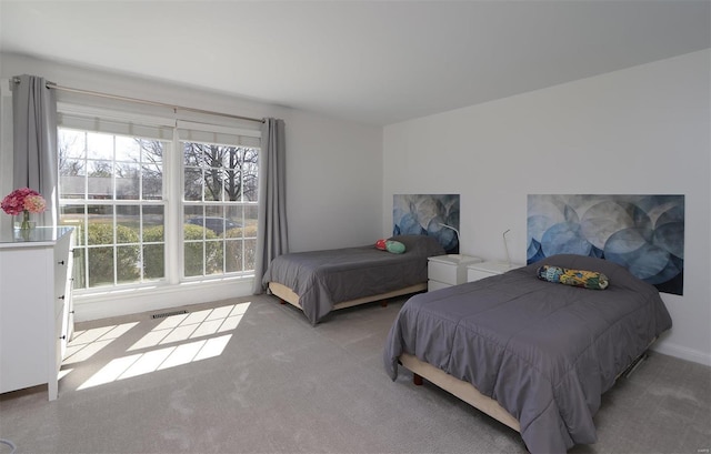 bedroom with carpet and visible vents