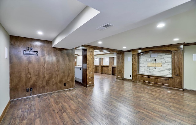 interior space with wood finished floors, visible vents, and recessed lighting