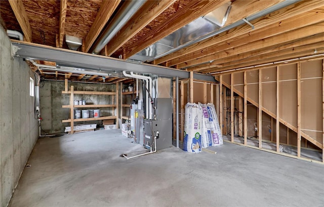 unfinished basement featuring heating unit