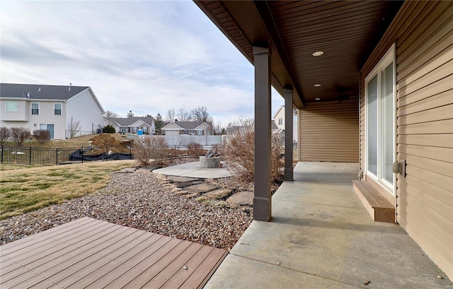 exterior space with a residential view and fence