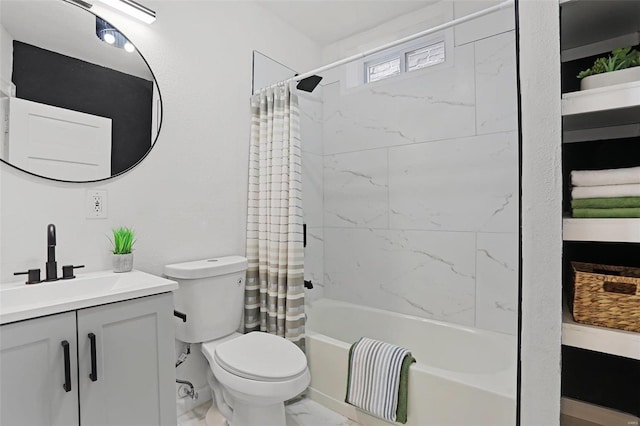 full bathroom featuring toilet, marble finish floor, shower / bath combination with curtain, and vanity